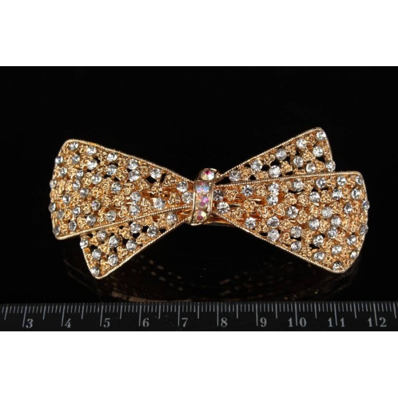 Заколка автоматическая под золото в виде бантика украшенная стразами