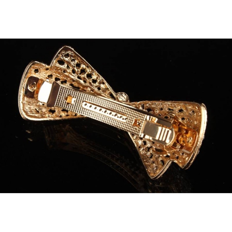 Заколка автоматическая под золото в виде бантика украшенная стразами