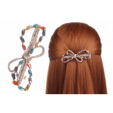 Заколка для волос автомат в виде бантика украшенная стразами и бусинами