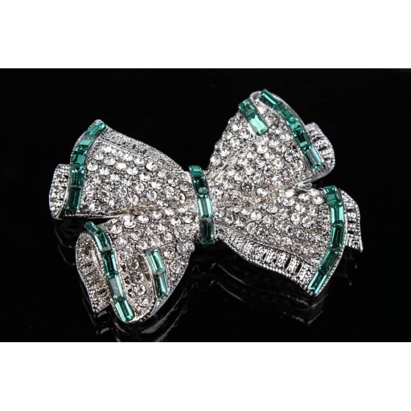 Брошь в виде бантика в стразах зеленая