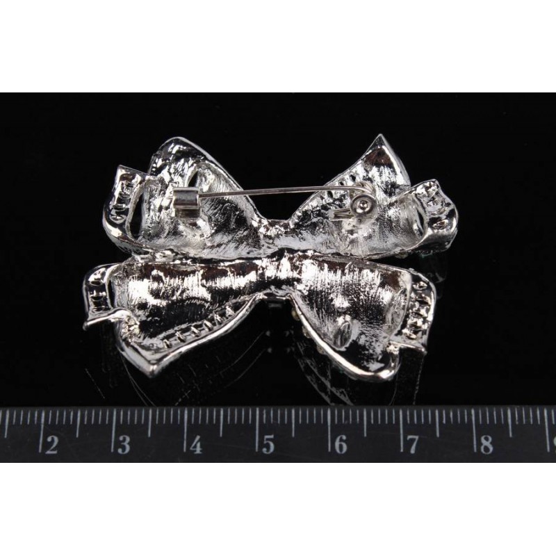 Брошь в виде бантика в стразах зеленая